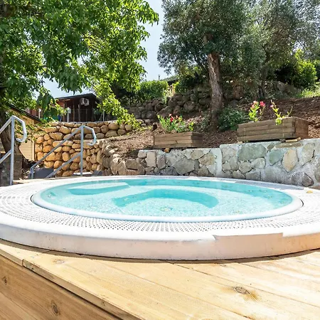 Holiday home Cozy In With Jacuzzi